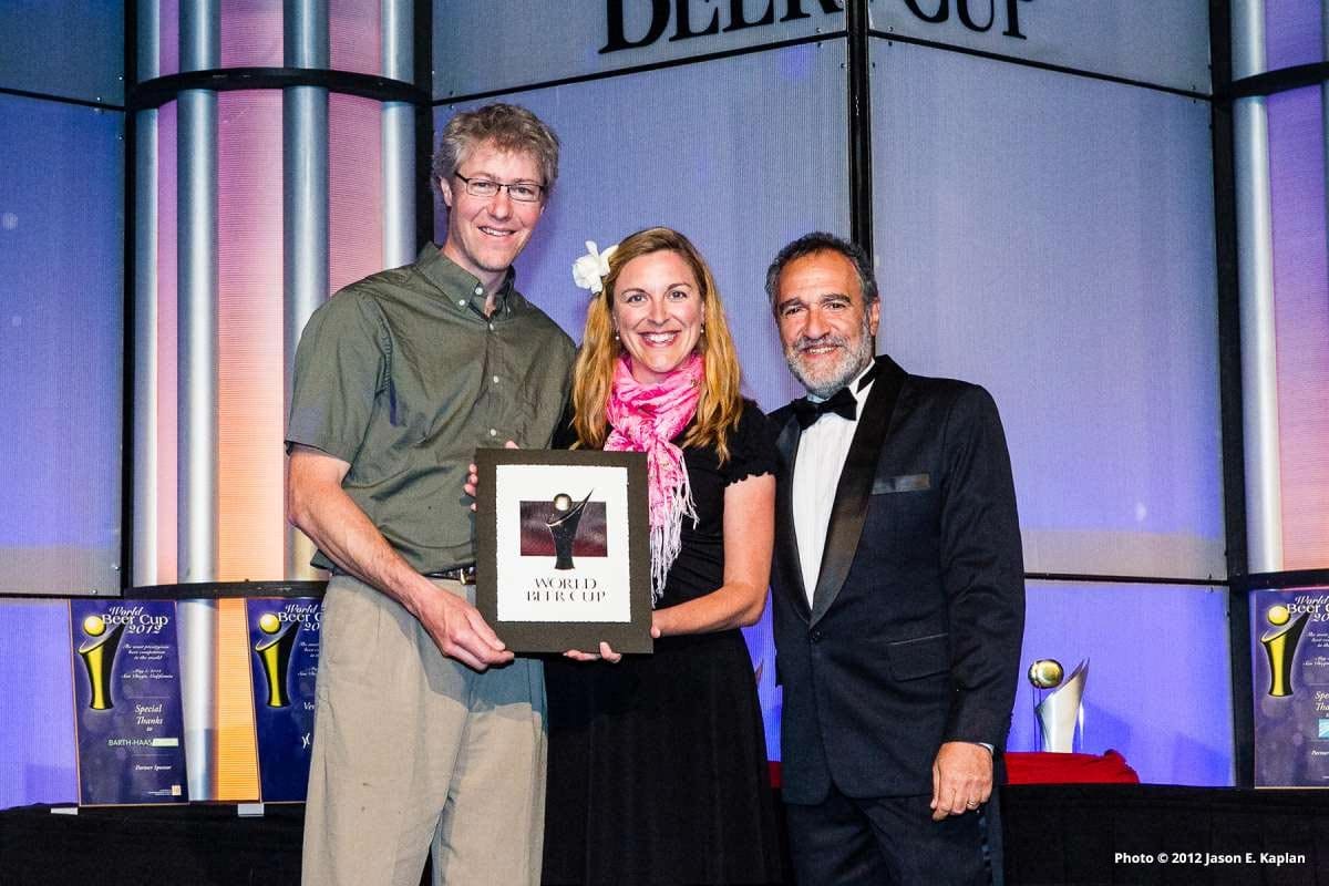 Sean and Karen Lawson pose with their World Beer Cup Award in 2012 alongside Charlie Papazian, president of the Brewers Association.